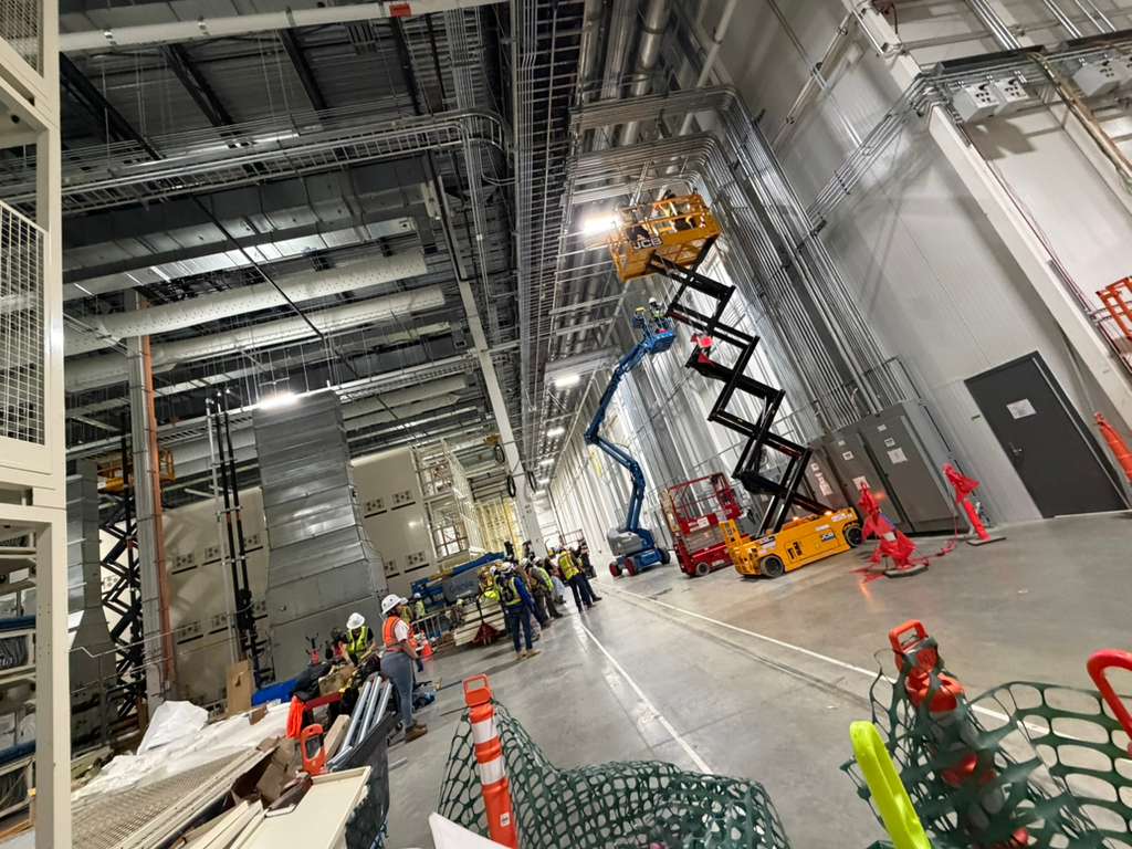 Vertical ductwork install inside automotive plant